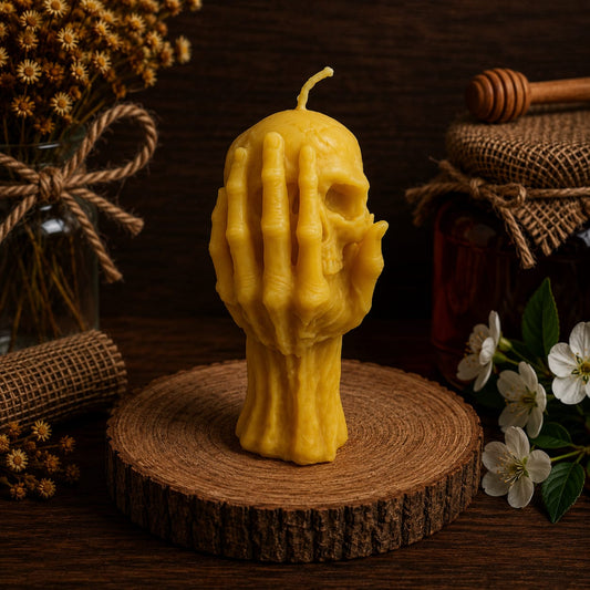 Skull in hand candle